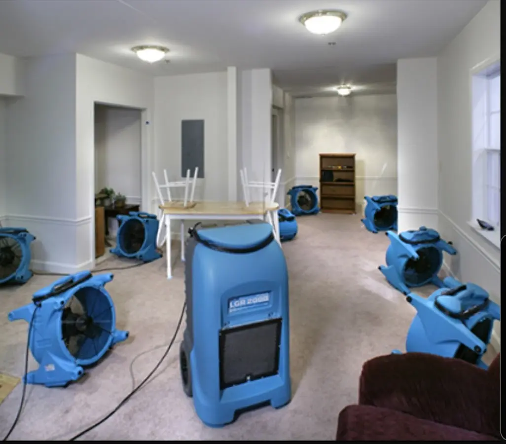 Air movers and dehumidifier setup for Water Damage Restoration in Upland
